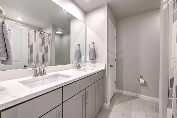Secondary Bath with Dual Sinks & Tub
