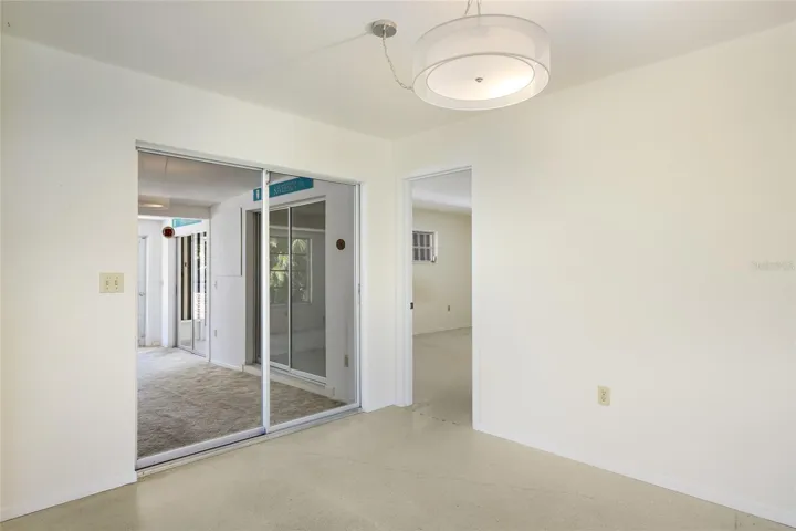 Dining room off Kitchen. Sliding door opens to family room.