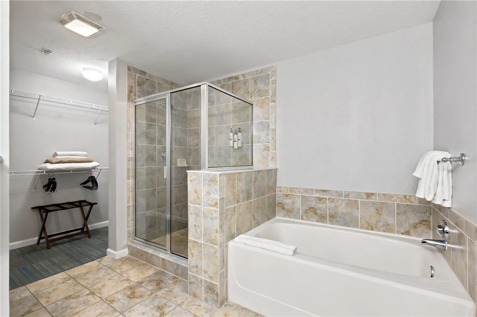 Primary Bathroom Has A Walk-In Shower & Garden Tub