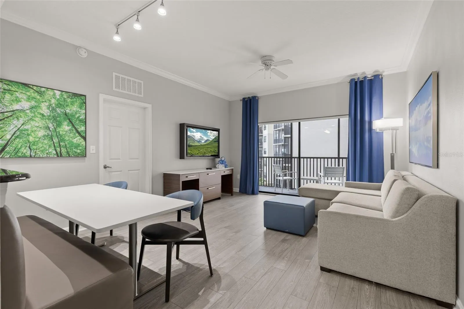 Living Room Has Spacious Room For Guests & Includes A Dining Room Space