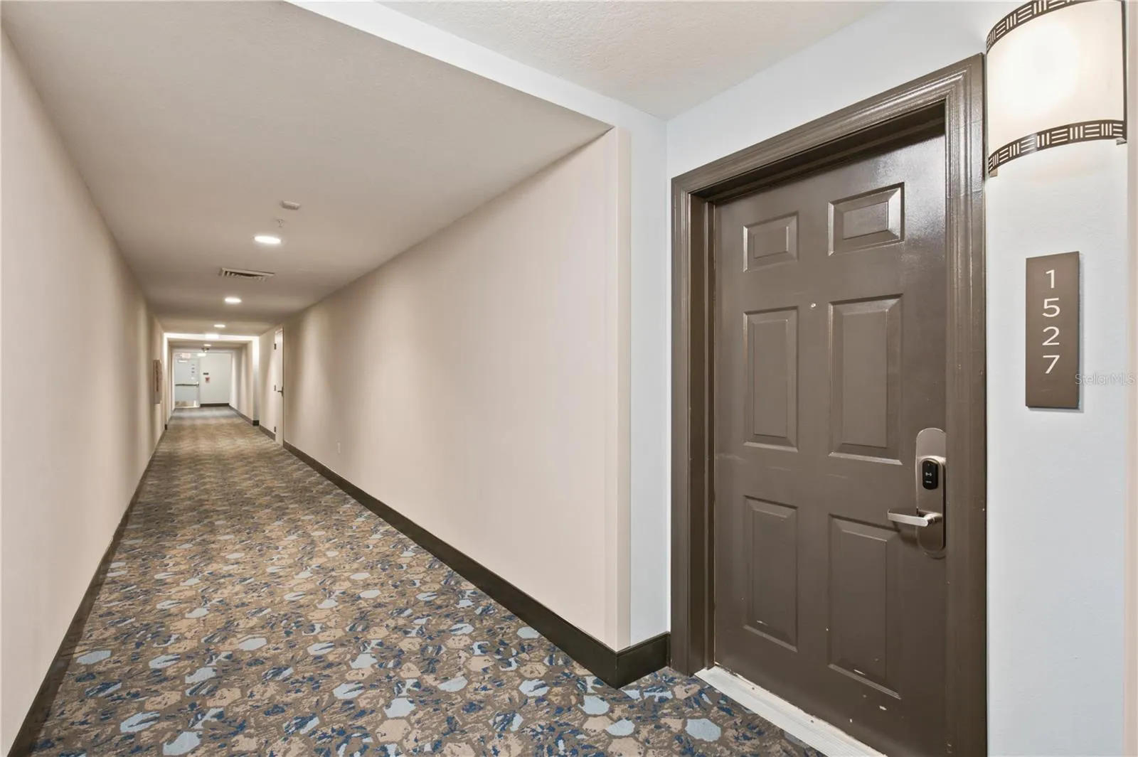 Unit 1527 Is Next To Walkway For Easy Entrance & Exit From Building