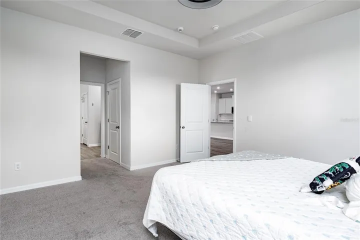 Primary Bedroom to primary bathroom
