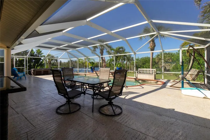 The fun continues onto the open deck area. Pool, hot tub and waterfront views make for a great life.
