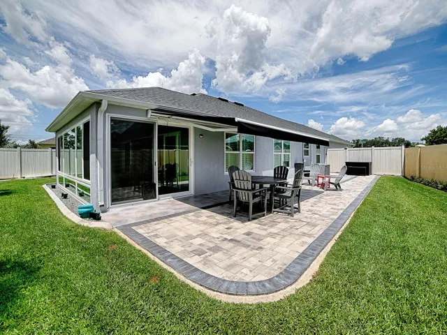 NEW PAVERED PATIO WITH REMOTE AWNING!