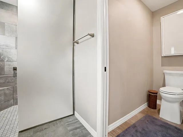 POCKET DOOR ON PRIVATE WATER CLOSET. THERE IS ALSO A LARGE WALK-IN CLOSET.
