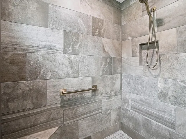 LOVELY TILED ROMAN SHOWER.