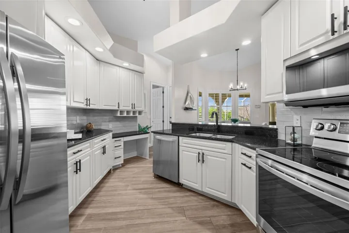 Stainless appliances and lots of cabinetry