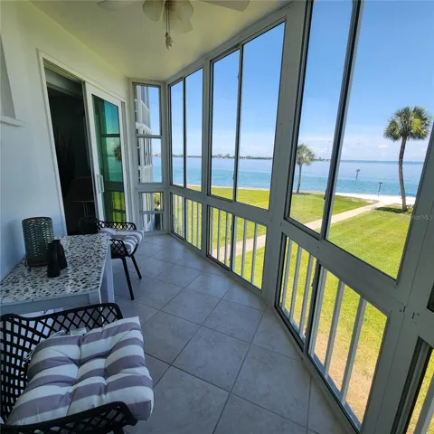 The enclosed lanai balcony is protected by hurricane impact windows