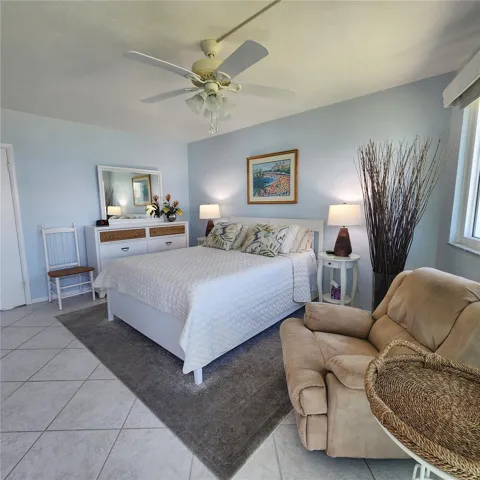 Looking back into the primary suite from the enclosed lanai balcony