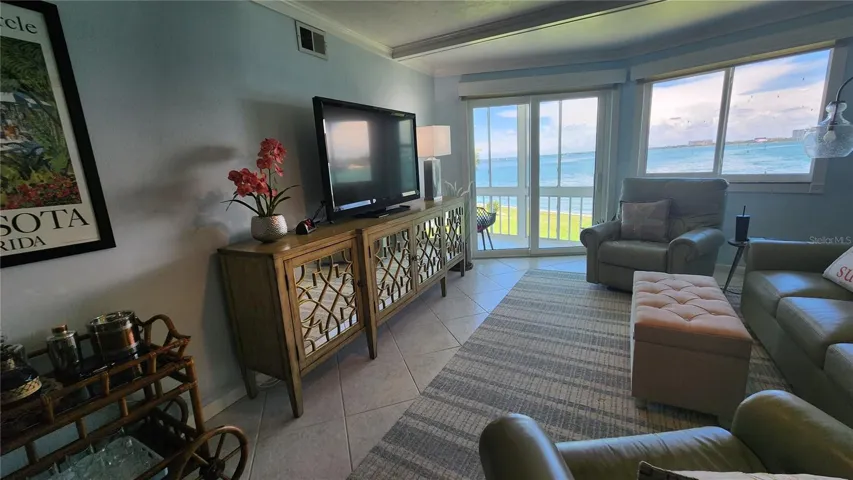 Step into the condo and fall in love with the sweeping views out onto Sarasota Bay and downtown