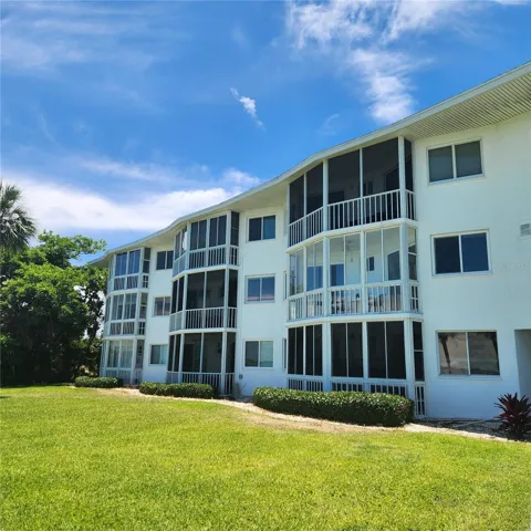 This is a view of the condo from the back lawn.  Unit 24 is the second floor unit on the right.
