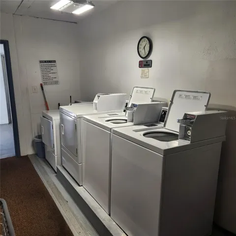 Other shared amenity is the public laundry room located right next to this condo