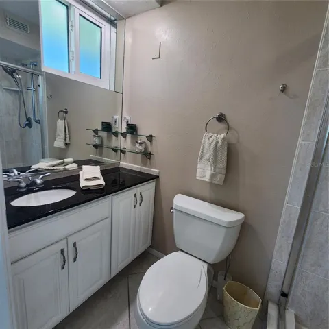 The ensuite bath located in the primary suite