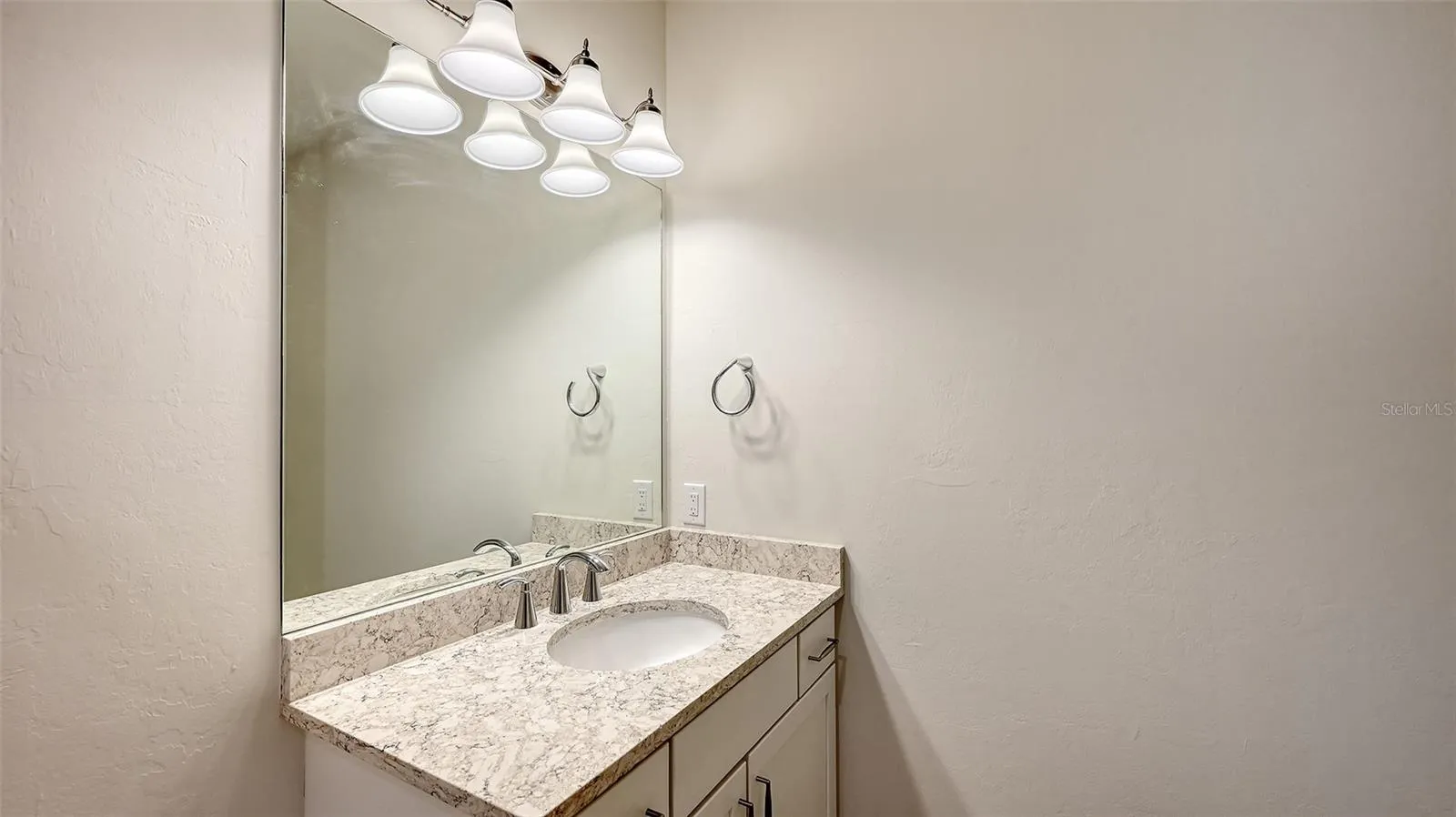 Quartz Vanity Tops in all Bathrooms