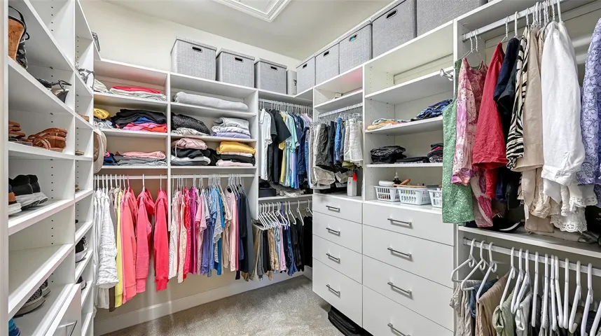 Primary Closet (One of Two) with Built-Ins