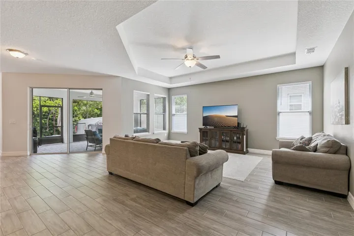 Family room with adjoining screened patio
