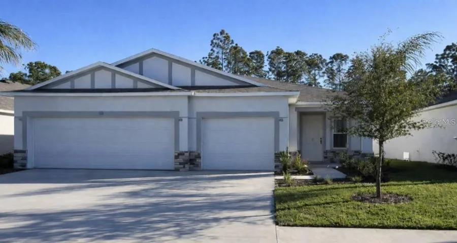 Model home - actual features may vary. - Block construction, stone accent & 3 car garage!
