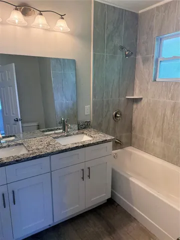 Primary ensuite includes additional door to hallway.