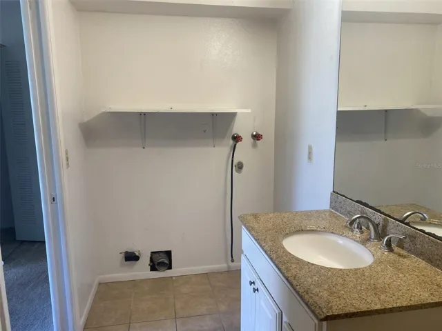 Primary Bathroom (with washer / dryer hook up)