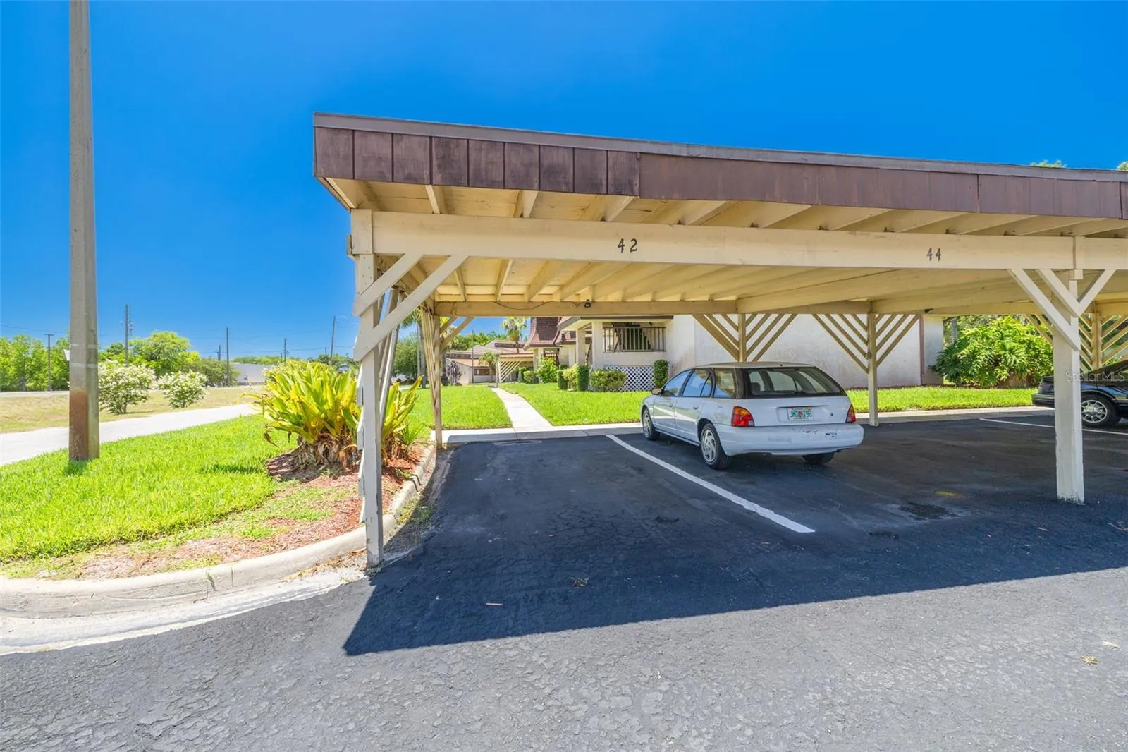 Assigned Carport near front entrance