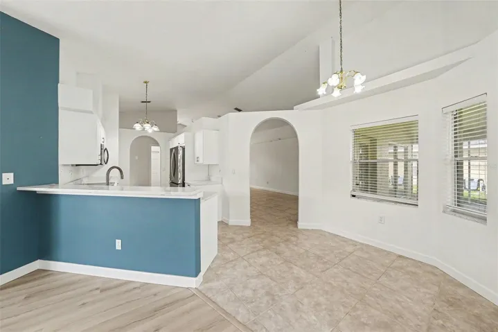 The kitchen overlooks the family room and the breakfast nook