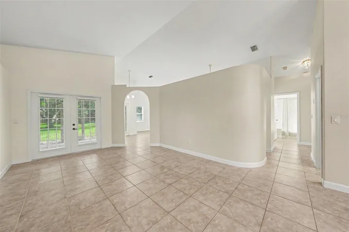 French doors lead to the large back yard