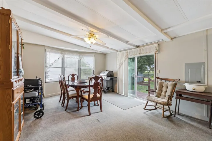 Formal Dining Room offers updated glass sliding doors