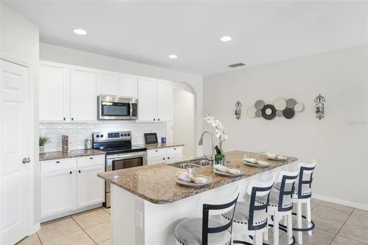 Large Kitchen with Grande Island and abundant seating space for functional living and entertaining.