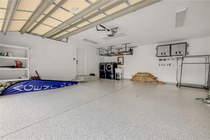 Oversized 2 car garage w storage and epoxy floor