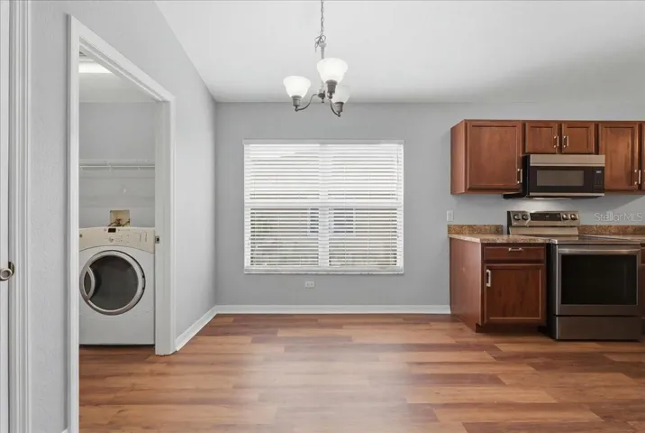 Kitchen nook and laundry room pic 1