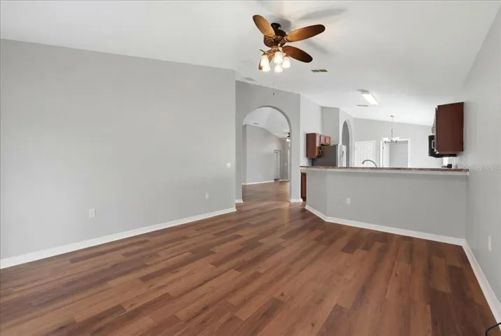 Dining room looking from sliding glass door to kitchen