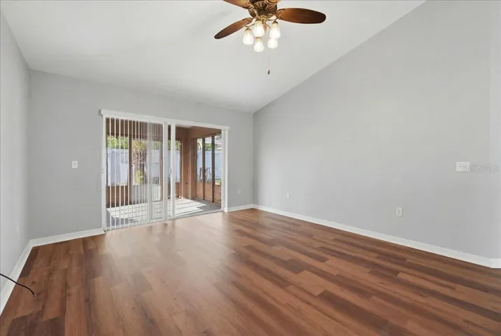 Dining Room view from kitchen to back sliding door