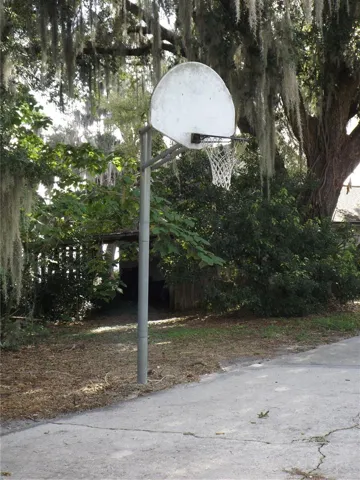Permanent fixed basketball hoop