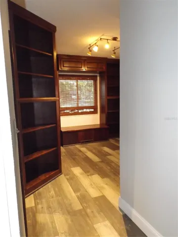 To the left is entry to dual closet/possibility to be office space