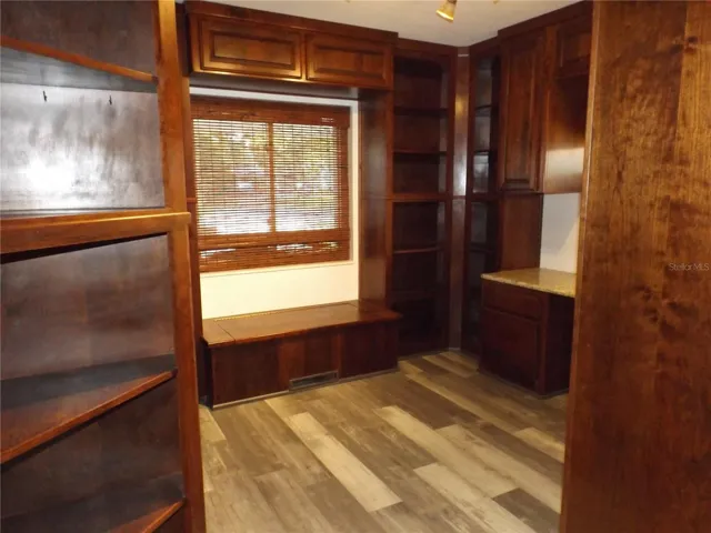 To the left is entry to dual closet/possibility to be office space