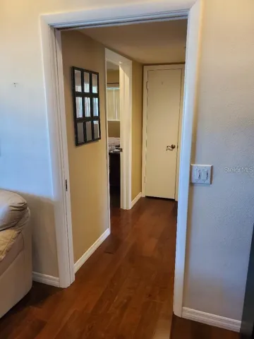 Pocket door to back bedrooms