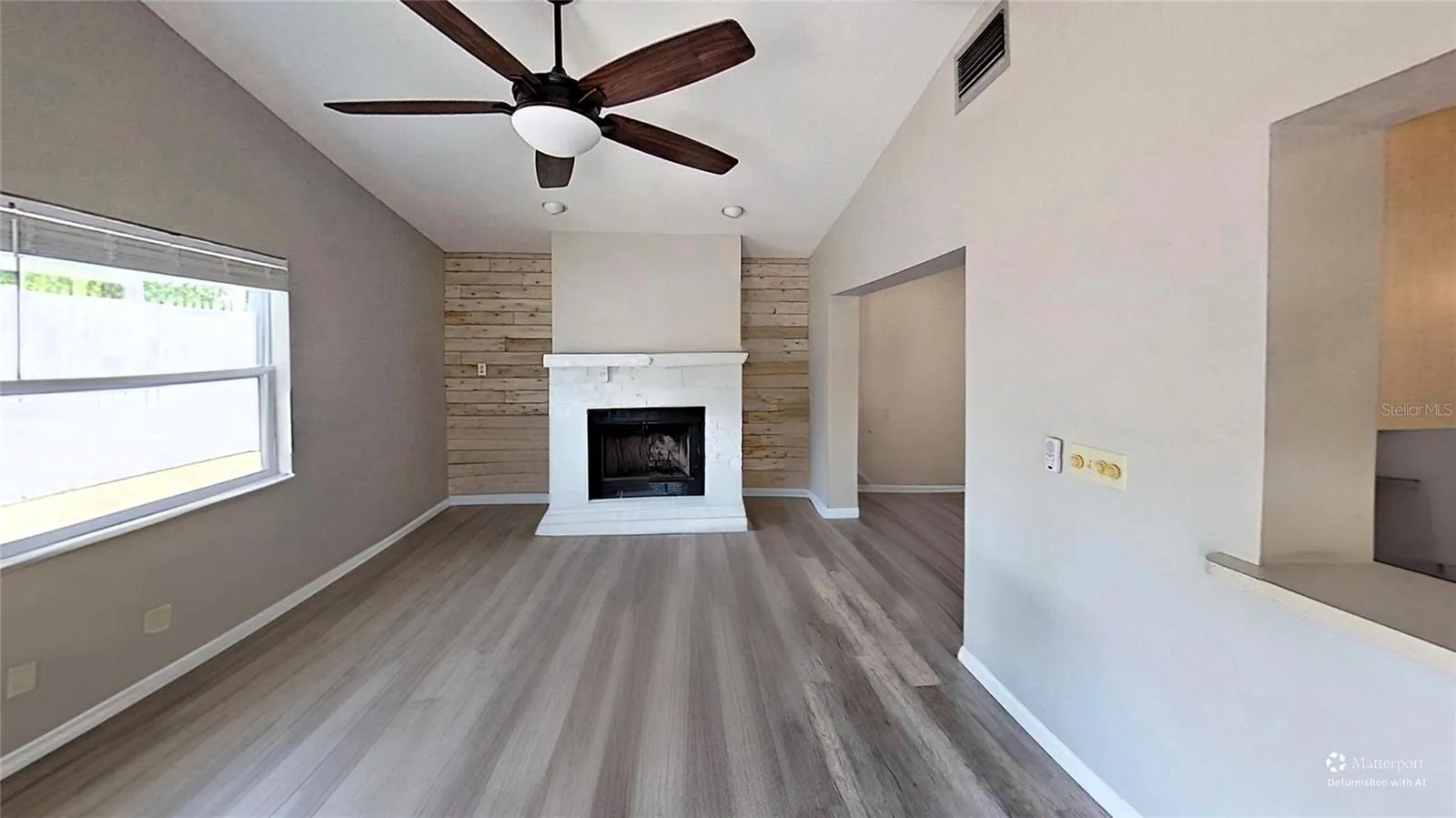 Family Rom With Wood Burning Fireplace