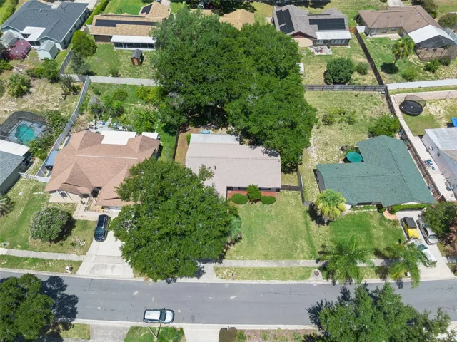 Aerial pictures.  This house gets lots of shade from the large trees so you can enjoy the lanai and backyard all year around.