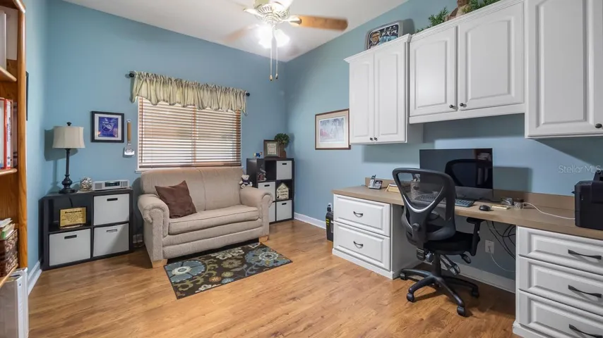 Office With Built Ins and Laminate Flooring