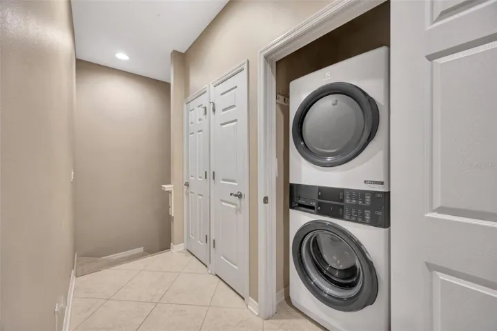Washer and dryer upstairs near bedrooms