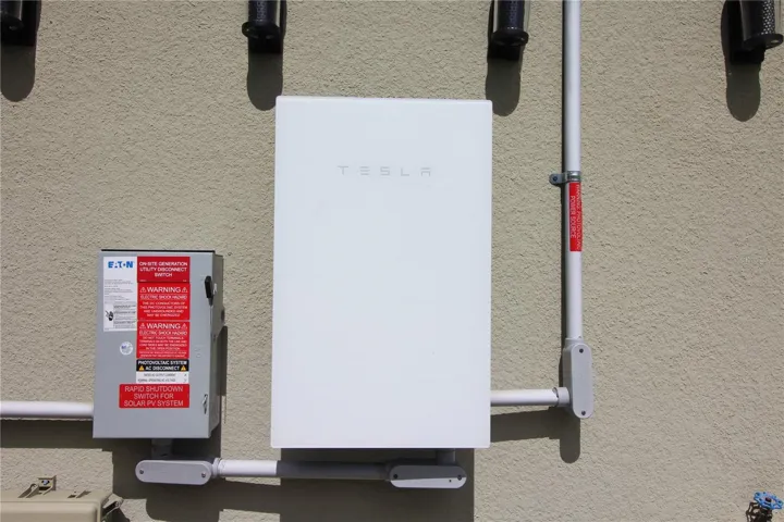 Tesla solar panels added 2 years ago and will be paid off at closing