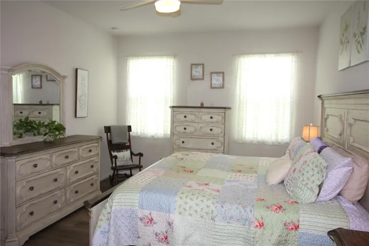 primary bedroom with  water views from windows
