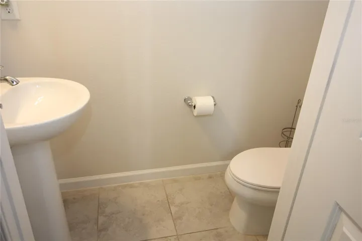 downstairs half bath off living room area