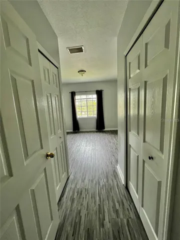 VIEW FROM MASTER BATH TO BDRM
