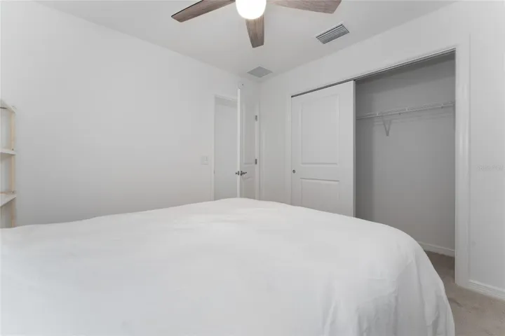 Bedroom 3 closet and storage view.
