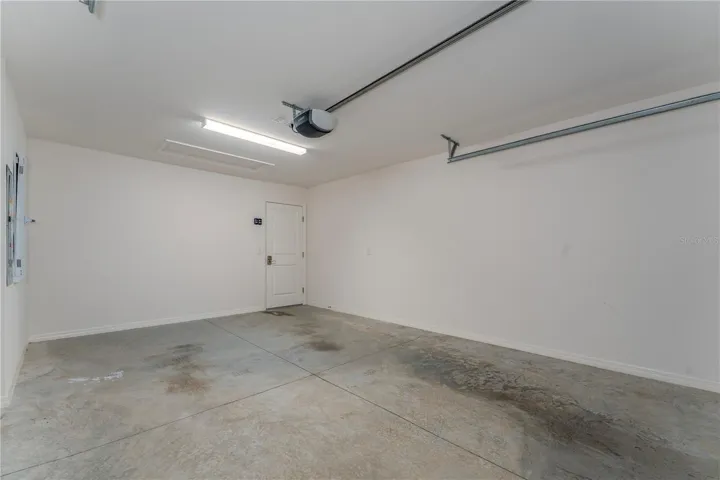 Alternate interior view of the 1-car garage and storage area.
