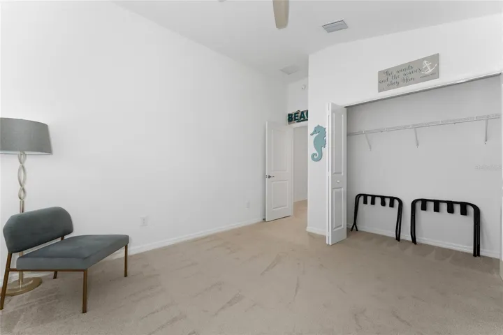 Bedroom 2 with closet storage and split-bedroom location.