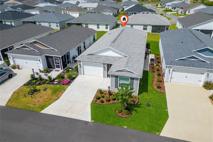 Aerial property view with roofline and location marker.