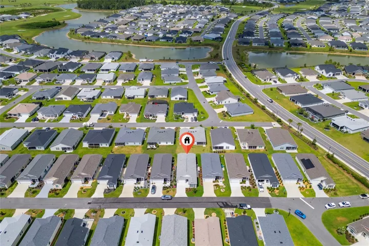 Aerial neighborhood view with home marker in Avery Villas.