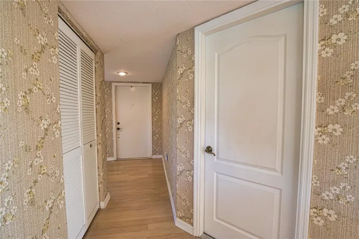 Front door straight ahead, pantry on left &amp; garage door to the right.